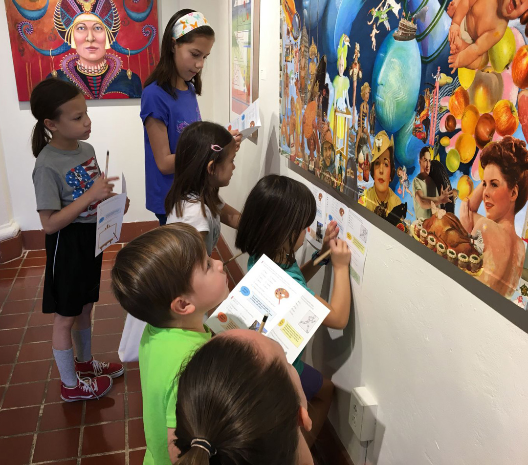 Image of children looking at art.