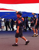 photo of child in 4th of July parade