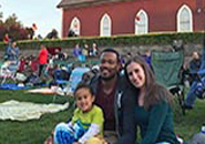 Picture of a family on the City Green